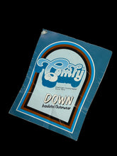 Load image into Gallery viewer, A close-up of a 1970s blue paper tag that reads 'Comfy DOWN Insulated Outerwear'
