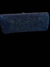 Load image into Gallery viewer, A dark blue beaded clutch shown from the bottom.
