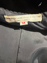 Load image into Gallery viewer, Close-up of the inside collar of a gray garment, showing a cream-colored label that reads 'MADE IN THE CROWN COLONY OF HONG KONG RN. 39578' and a small red size tag marked '14'.
