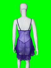 Load image into Gallery viewer, A purple sheer lingerie chemise with lace trim and a lace skirt, displayed on a white mannequin from the back against a plain indoor wall.
