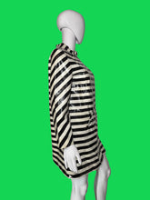 Load image into Gallery viewer, A black and off-white striped long-sleeve tunic top displayed on a white mannequin.
