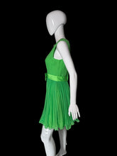 Load image into Gallery viewer, A bright green sleeveless dress displayed on a white mannequin.
