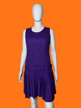 Load image into Gallery viewer, A purple sleeveless dress with a textured bodice and pleated skirt, displayed on a white mannequin.

