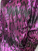 Load image into Gallery viewer, Close up of metallic black button up with purple shimmering flames and light purple buttons. 
