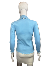 Load image into Gallery viewer, Light blue ribbed top on a mannequin against a plain background
