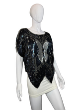 Load image into Gallery viewer, Mannequin wearing a black sequined top with a white background
