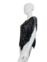 Load image into Gallery viewer, Mannequin wearing a black sequined top against a plain wall.
