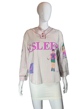 Load image into Gallery viewer, Mannequin wearing a striped shirt with &#39;SLEEP&#39; printed on it against a neutral background
