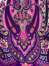 Load image into Gallery viewer, A close-up of a vibrant paisley fabric pattern featuring bold shades of purple, pink, lime green, and black.
