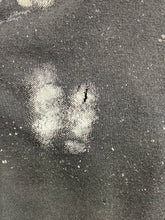 Load image into Gallery viewer, Close-up of fabric with small hole.

