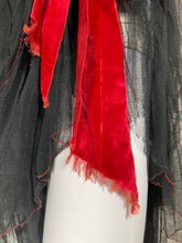 Load image into Gallery viewer, Multi-layered mesh sheer skirt with red threaded hems on each layer and a red velvet sash highlighting the hiked skirt on the right side.
