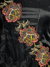 Load image into Gallery viewer, Coral, navy, and yellow embroidered floral applique  on black satin fabric. 

