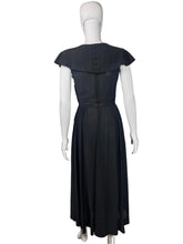 Load image into Gallery viewer, Black dress on a mannequin against a plain background
