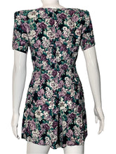 Load image into Gallery viewer, Floral patterned romper on a mannequin against a white background
