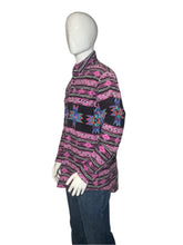 Load image into Gallery viewer, Mannequin wearing a colorful patterned garment on a white surface
