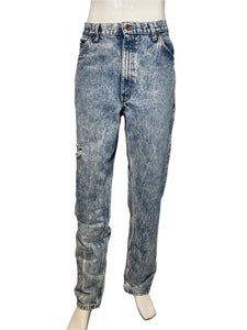 Blue acid-wash jeans on a white surface