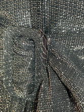 Load image into Gallery viewer, Close-up of wear on the belt buckle
