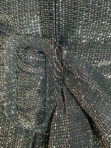 Close-up of wear on the belt buckle