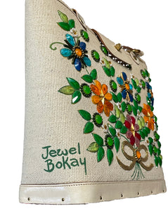 Handbag with floral embellishments and 'Jewel Bokay' writing