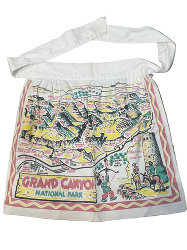 novelty apron with Grand Canyon National Park design on a gray surface