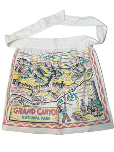 novelty apron with Grand Canyon National Park design on a gray surface